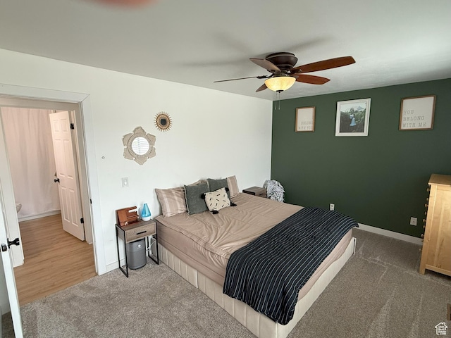 5582 W Joshua Cir S, West Jordan, UT 84081 - carpeted bedroom with baseboards and ceiling fan
