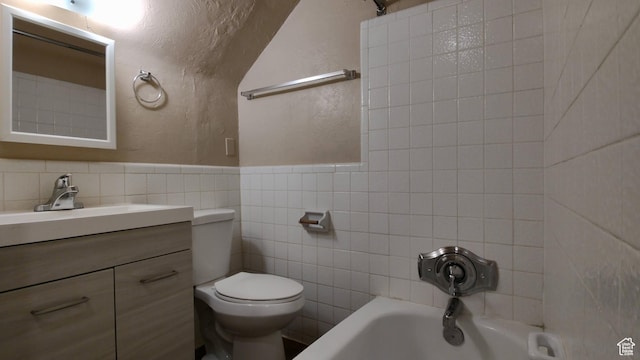 2172 S 800 E, Salt Lake City, UT 84106 - bathroom with tile walls, a textured wall, toilet, vanity, and  shower combination