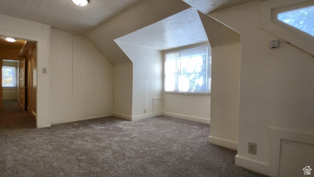 2172 S 800 E, Salt Lake City, UT 84106 - additional living space featuring lofted ceiling, carpet floors, and baseboards