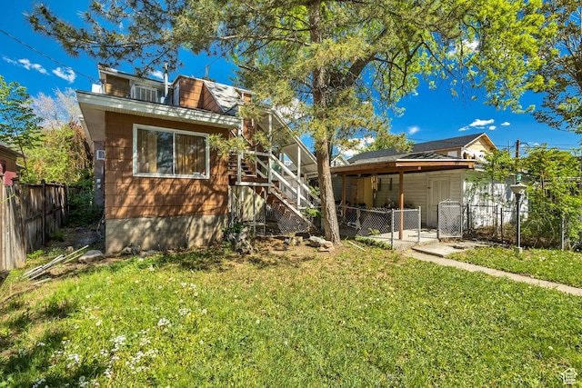 2172 S 800 E, Salt Lake City, UT 84106 - rear view of property featuring a gate and stairway