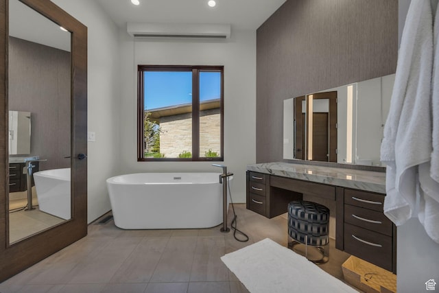 800 Hollyhock St, Park City, UT 84098 - bathroom featuring vanity, a freestanding bath, and recessed lighting