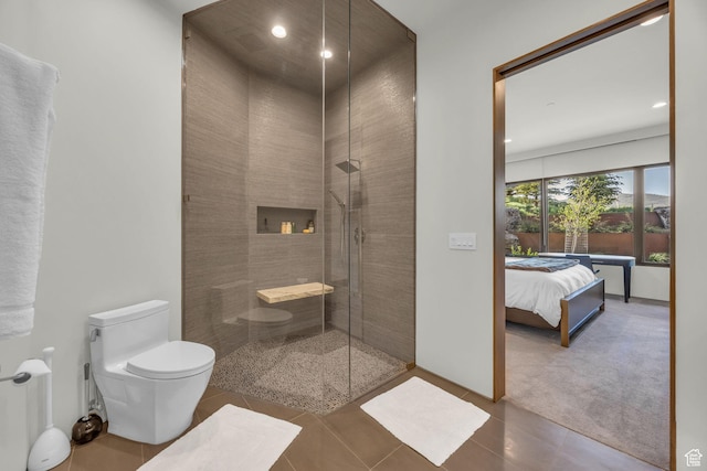 800 Hollyhock St, Park City, UT 84098 - ensuite bathroom with toilet, a tile shower, tile patterned flooring, and recessed lighting