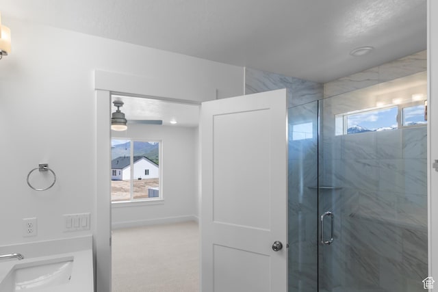 564 N 800 W, Smithfield, UT 84335 - full bathroom with healthy amount of natural light, a shower stall, and a ceiling fan