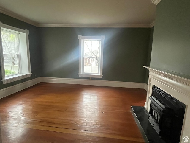 375 E 200 S, Centerville, UT 84014 - unfurnished living room with a fireplace, hardwood / wood-style floors, plenty of natural light, crown molding, and baseboards