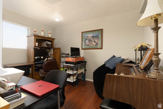 home office with wood finished floors and baseboards