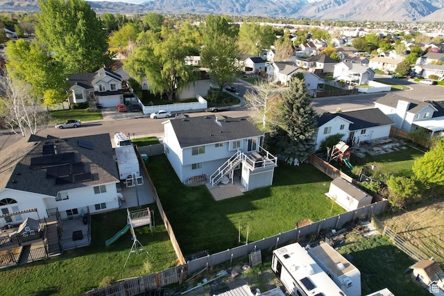 aerial view of residential area with a mountainous background