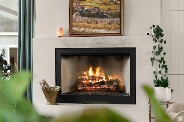 10076 S Wild Goose Cv E, Sandy, UT 84092 - detailed view of a lit fireplace