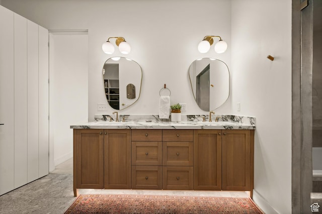 10076 S Wild Goose Cv E, Sandy, UT 84092 - full bath with double vanity and baseboards