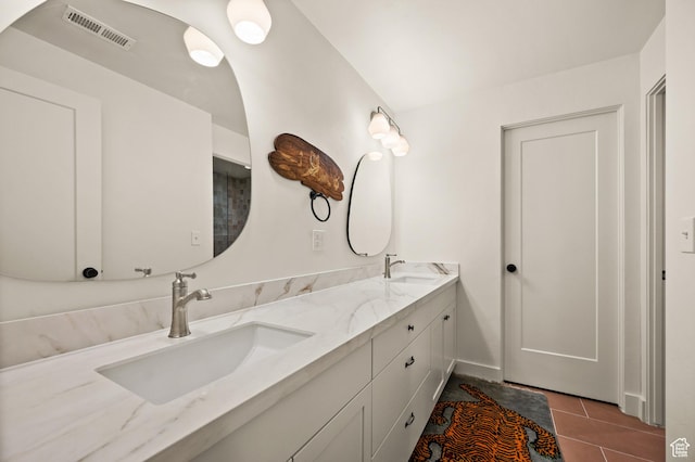 10076 S Wild Goose Cv E, Sandy, UT 84092 - bathroom with double vanity and tile patterned floors