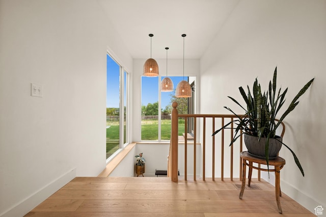 10076 S Wild Goose Cv E, Sandy, UT 84092 - corridor featuring baseboards and an upstairs landing