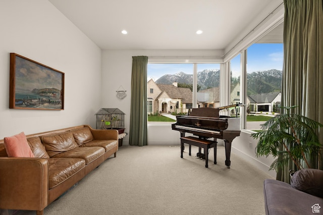 10076 S Wild Goose Cv E, Sandy, UT 84092 - sitting room featuring carpet floors, a mountain view, and recessed lighting