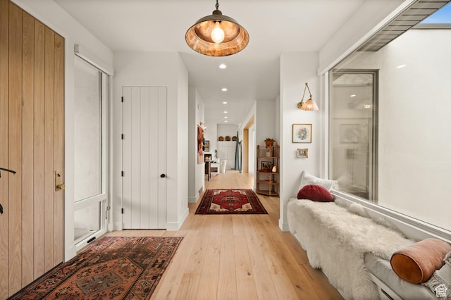 10076 S Wild Goose Cv E, Sandy, UT 84092 - hallway with light wood-style flooring and recessed lighting
