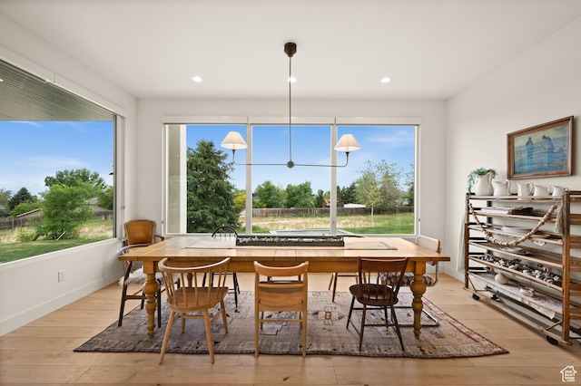 10076 S Wild Goose Cv E, Sandy, UT 84092 - dining room featuring light wood-style flooring, baseboards, and recessed lighting