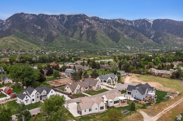 10076 S Wild Goose Cv E, Sandy, UT 84092 - aerial view of residential area featuring a mountainous background