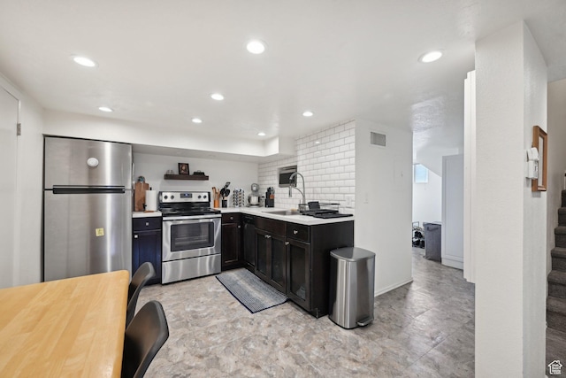 230 S 600 E, Provo, UT 84606 - kitchen featuring stainless steel appliances, a sink, recessed lighting, light countertops, and backsplash