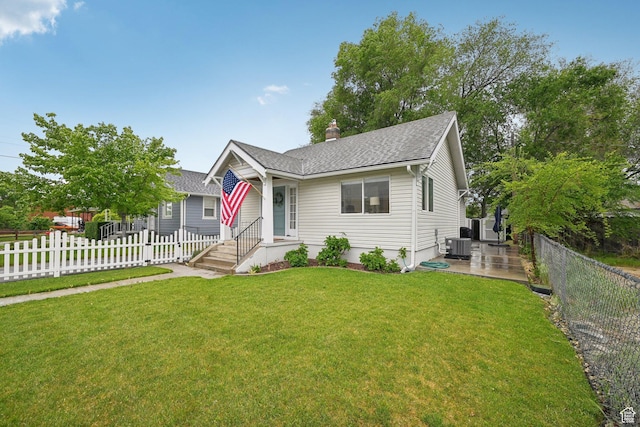 230 S 600 E, Provo, UT 84606 - view of front of property featuring roof with shingles, central AC, and a chimney