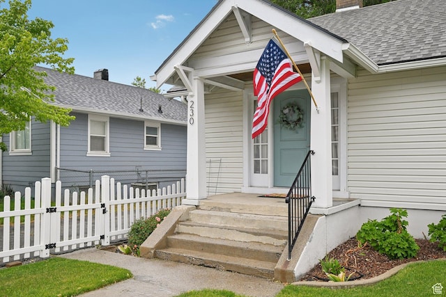 230 S 600 E, Provo, UT 84606 - doorway to property with a chimney, a shingled roof, and fence