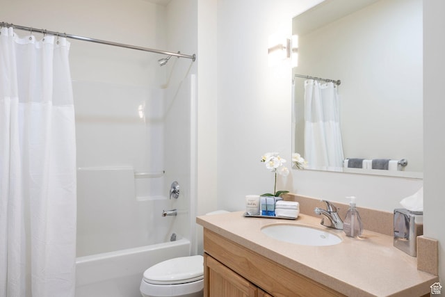 full bath with toilet, vanity, and shower / tub combo with curtain