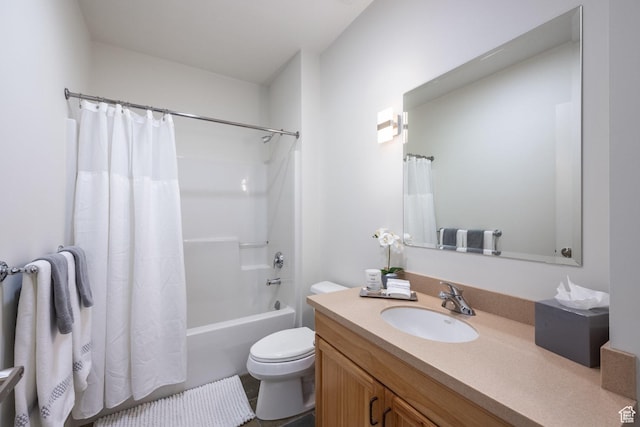 full bathroom featuring toilet, vanity, and shower / tub combo