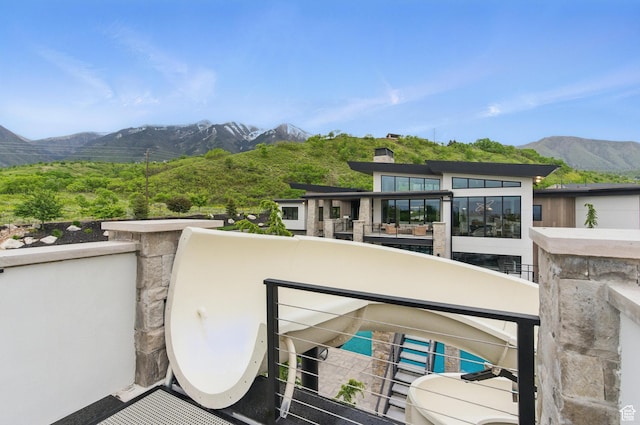 balcony featuring a mountain view
