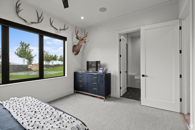 bedroom with carpet flooring, ensuite bath, and recessed lighting