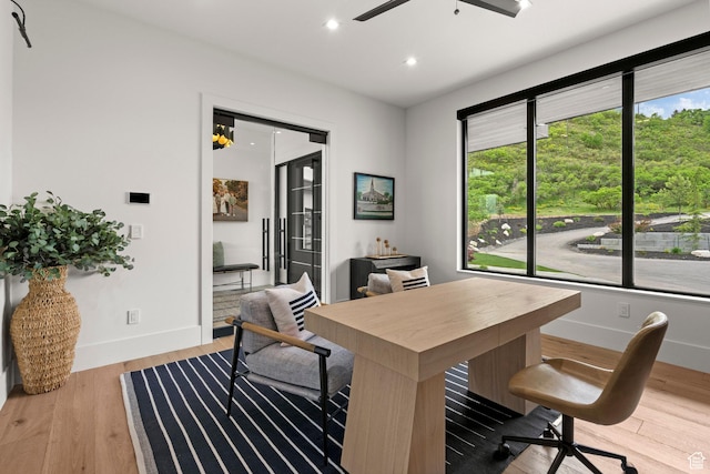 office area featuring baseboards, wood finished floors, ceiling fan, and recessed lighting