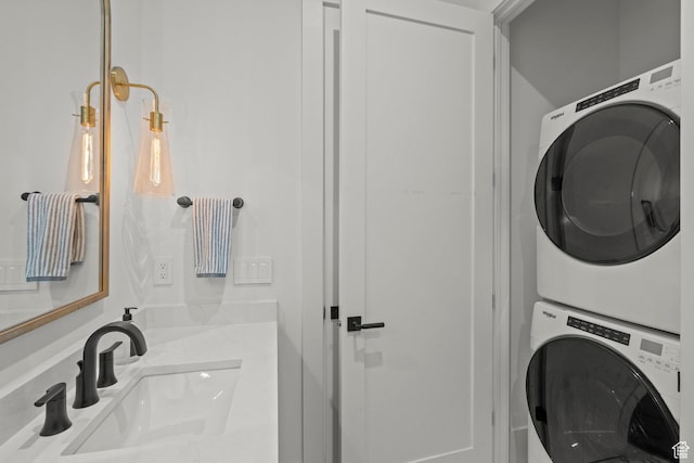 washroom with estacked washer and dryer