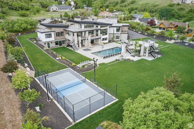 aerial view of residential area with a pool area