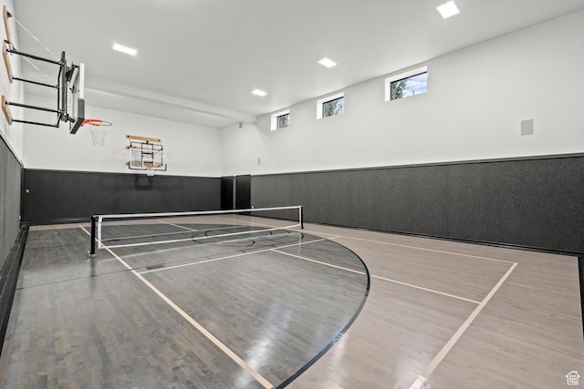 view of sport court featuring community basketball court and a tennis court