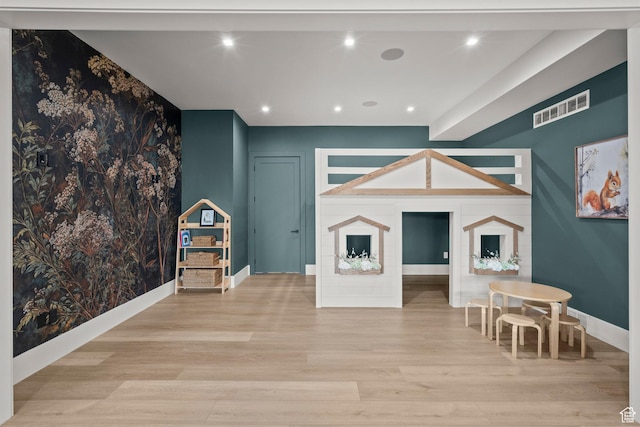 playroom featuring wood finished floors, baseboards, and recessed lighting