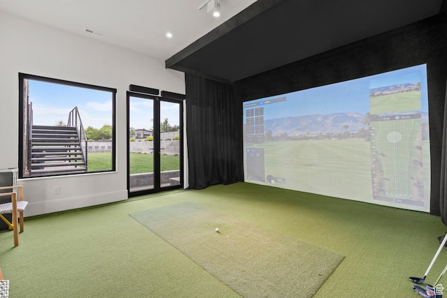playroom featuring golf simulator, carpet, and baseboards