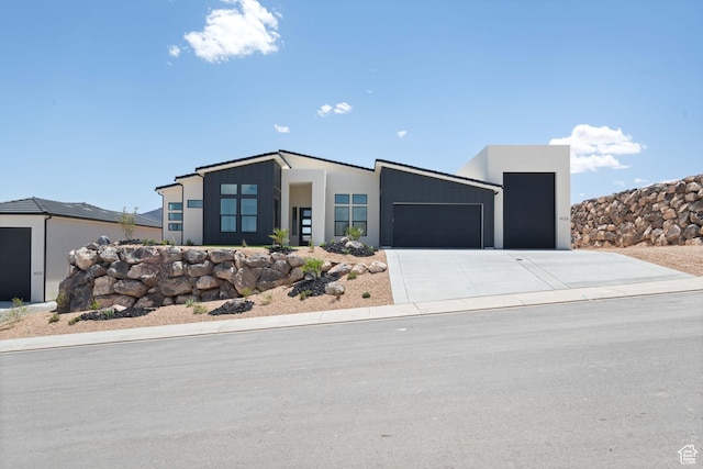 contemporary house with a garage and driveway