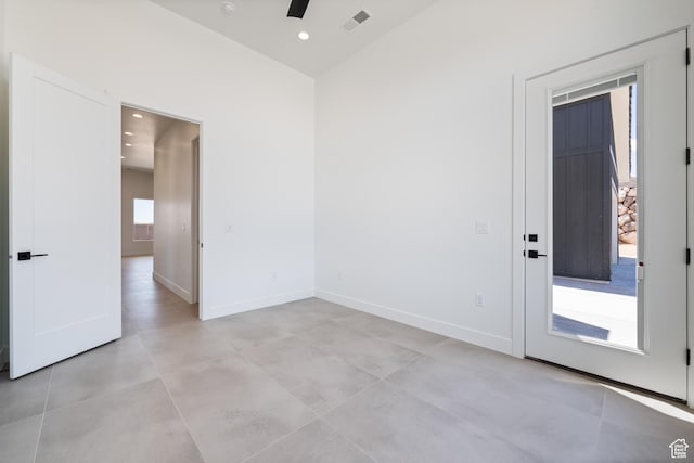 unfurnished room with baseboards, ceiling fan, and recessed lighting