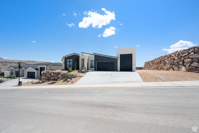 contemporary home with concrete driveway