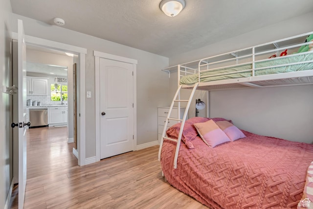 120 N 5th St, Tooele, UT 84074 - bedroom with light wood finished floors and baseboards