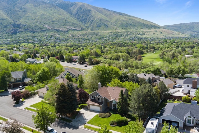 aerial perspective of suburban area featuring a mountain backdrop