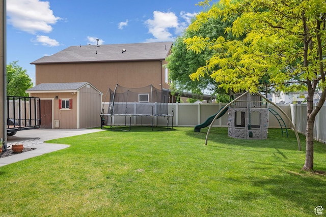 1066 W 1325 S, Springville, UT 84663 - view of yard featuring a trampoline, a playground, an outdoor structure, a shed, and a patio area