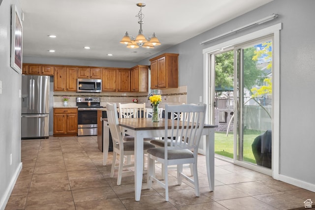 1066 W 1325 S, Springville, UT 84663 - dining room featuring a chandelier, baseboards, light tile patterned flooring, and recessed lighting