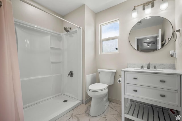 1066 W 1325 S, Springville, UT 84663 - bathroom with marble look tiles, a stall shower, toilet, vanity, and baseboards