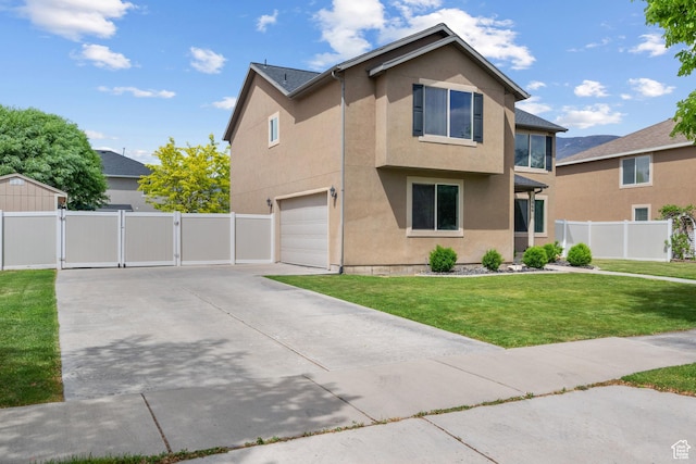 1066 W 1325 S, Springville, UT 84663 - traditional-style home featuring a gate, stucco siding, an attached garage, and driveway