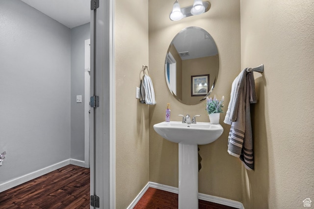 1066 W 1325 S, Springville, UT 84663 - bathroom featuring wood finished floors, baseboards, and a sink