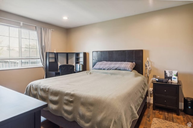 bedroom featuring wood finished floors and recessed lighting