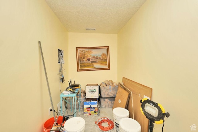 4631 S Park Ln W, Roy, UT 84067 - bathroom featuring a textured ceiling and toilet