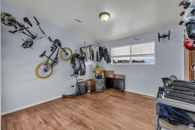 misc room with wood finished floors and baseboards