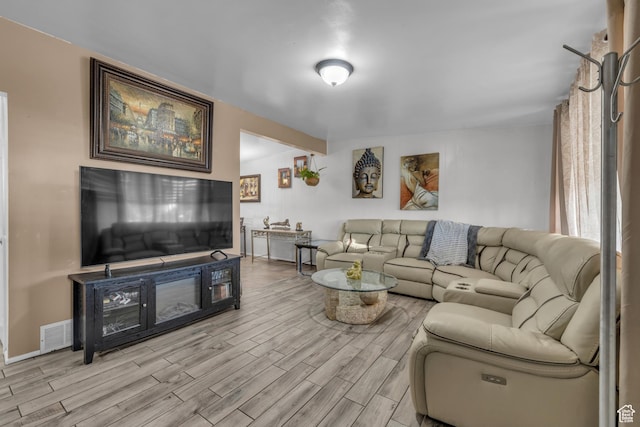 living room featuring light wood-style flooring