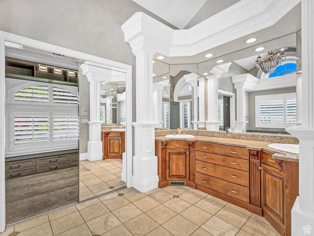 10868 S Prescott Dr E, Sandy, UT 84092 - full bath featuring decorative columns, tile patterned flooring, vanity, recessed lighting, and crown molding
