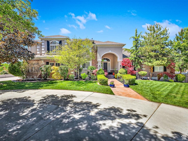10868 S Prescott Dr E, Sandy, UT 84092 - mediterranean / spanish-style home with stucco siding and a front yard