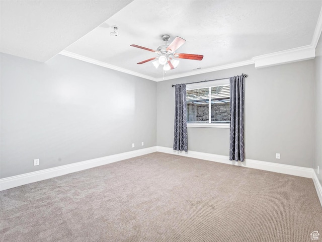 10868 S Prescott Dr E, Sandy, UT 84092 - empty room with a ceiling fan, carpet flooring, crown molding, and baseboards