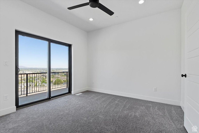carpeted spare room with a ceiling fan, baseboards, and recessed lighting