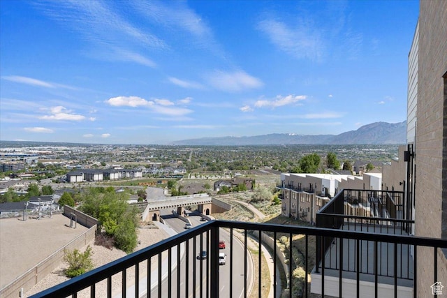 balcony featuring a mountain view